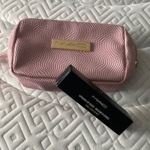 MAC lipglass. Clear. New in box with pink makeup case